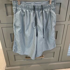 Men’s Nike dri fit brief lined running shorts.